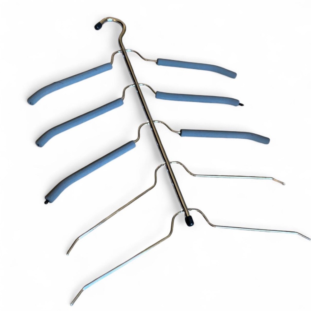 Multi-tier space saving shirt hangers (2). One holds 5 and the other holds 4.